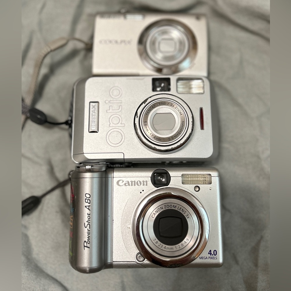 Nikon S4000, Canon A85, Pentax Optio 33LF